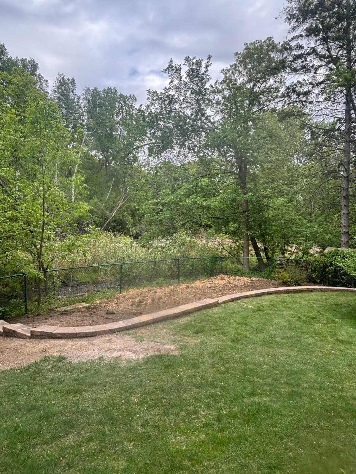Stylish Backyard Retaining Wall for Modern Spaces image